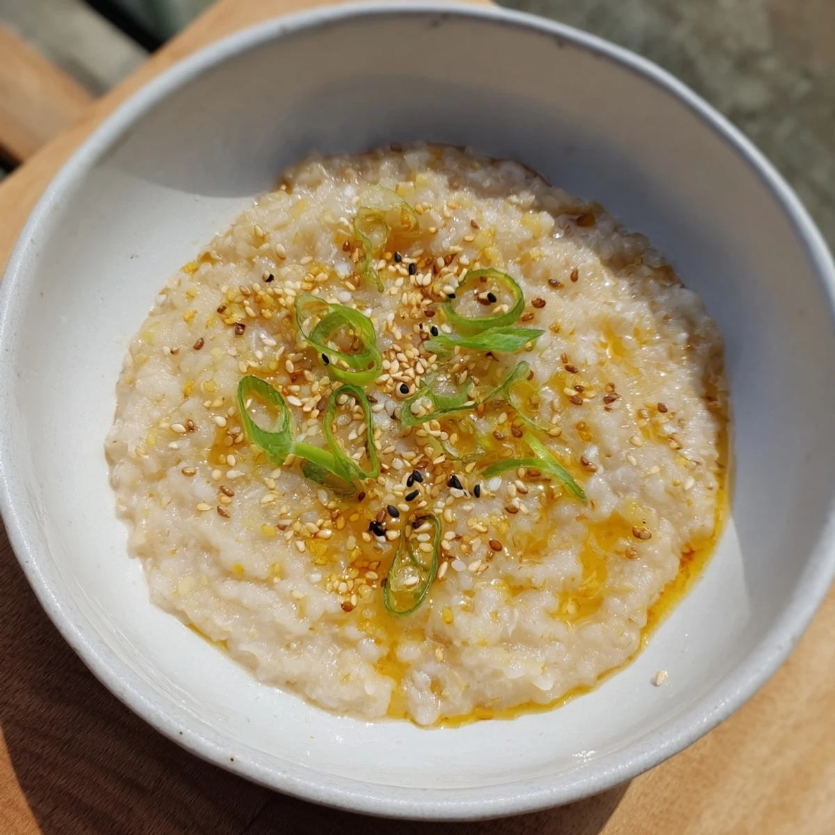 Warm and creamy ginger porridge, perfect for a cozy breakfast on a chilly morning.