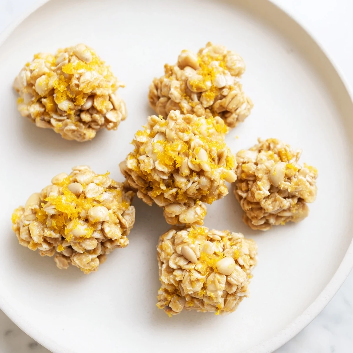 Plated Wholesome Citrus Clusters, filled with warm, inviting citrus aroma, ready for a healthy snack or dessert.