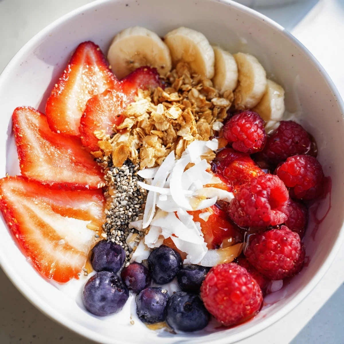 Enjoy this easy, refreshing vegan berry bowl with a delightful mix of flavors and textures.