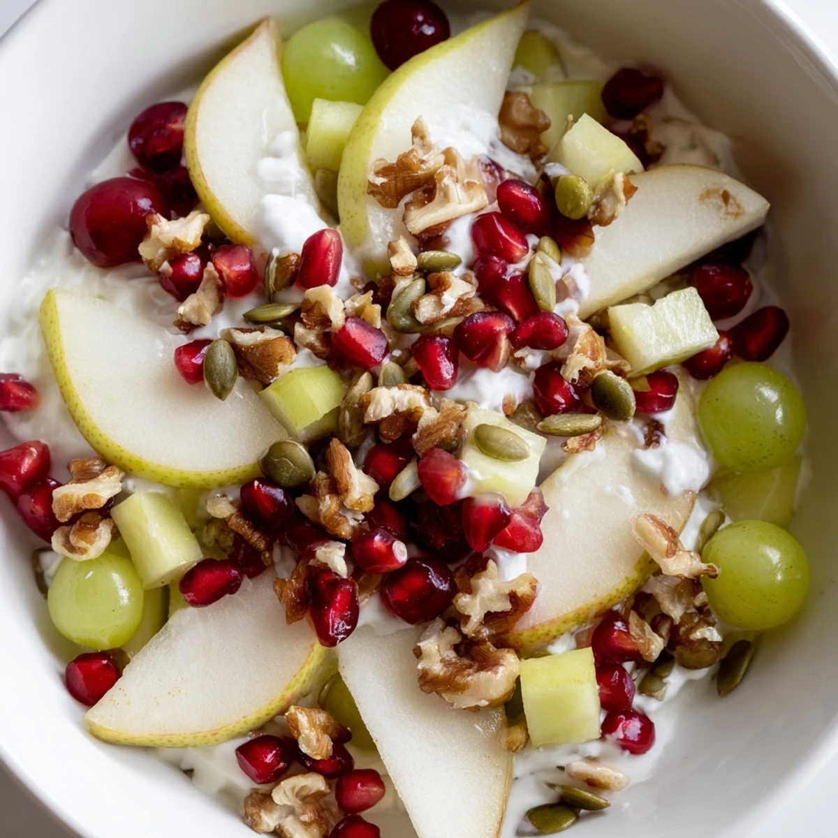 Freshly assembled Seasonal Pear Bowl: a close-up of colorful, healthy ingredients, ready to eat.