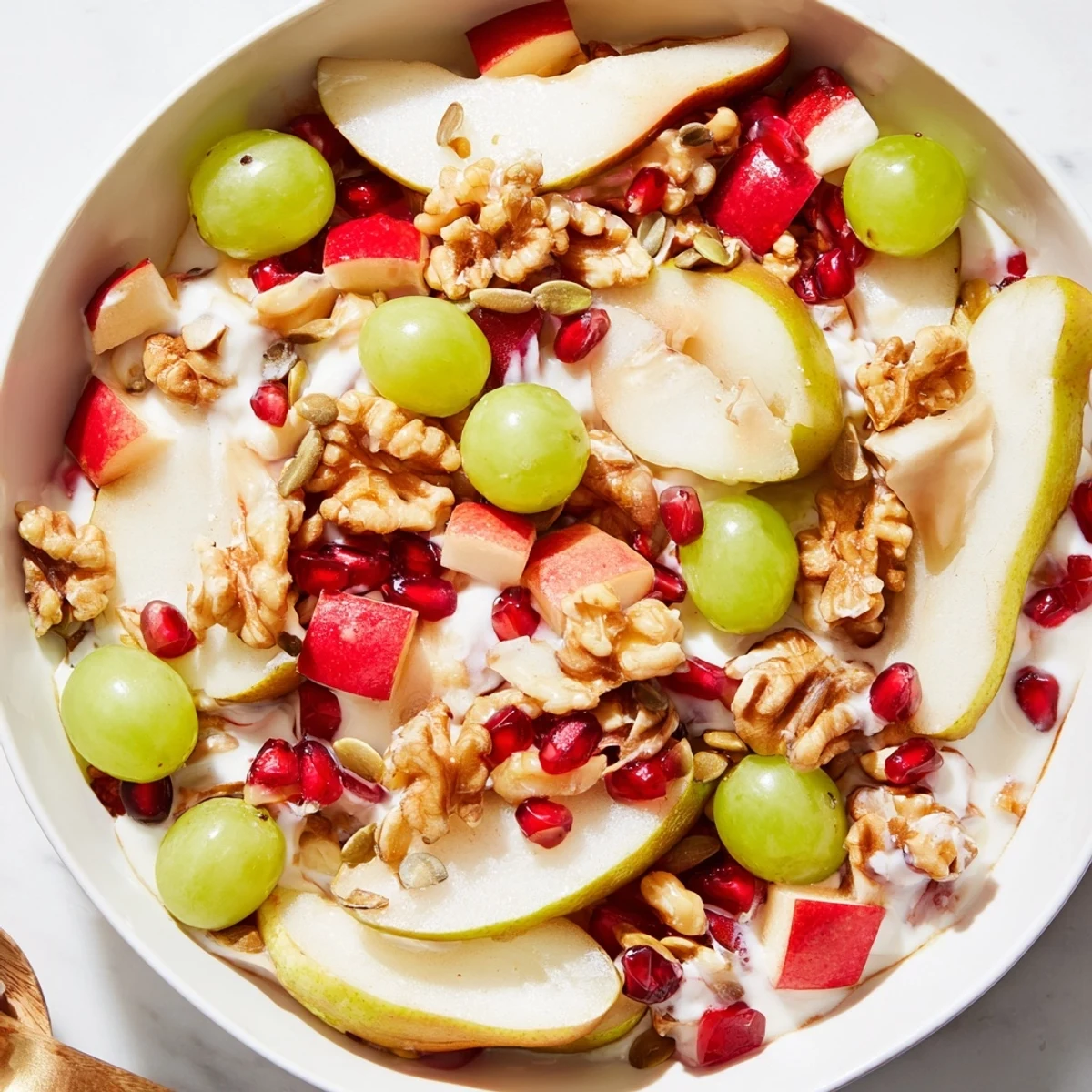 Close shot of a beautifully arranged Seasonal Pear Bowl, a perfect breakfast or dessert option.