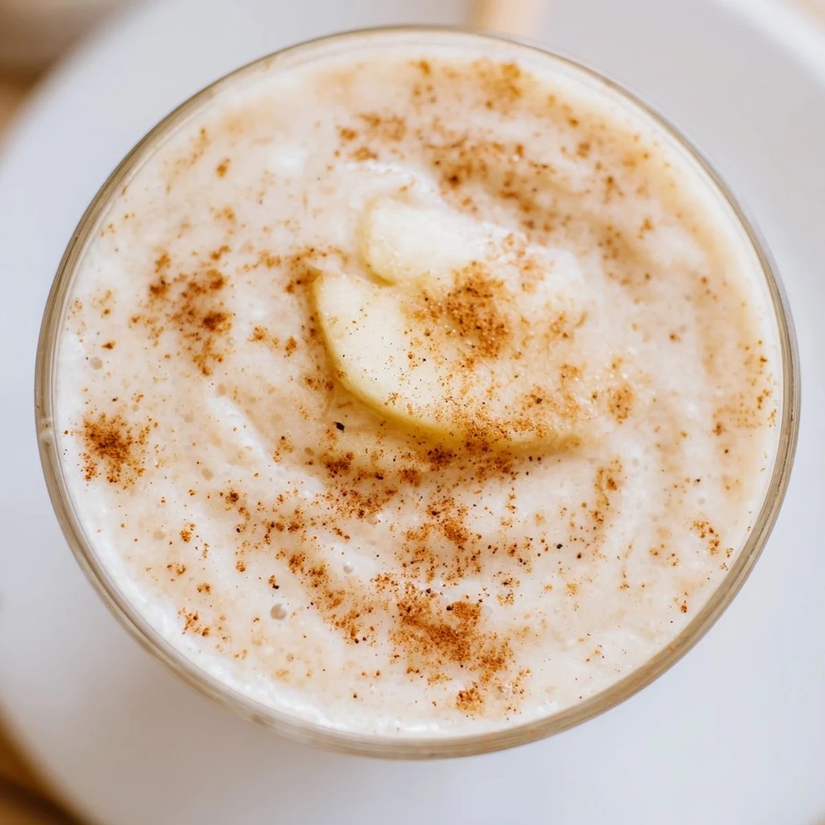 A vibrant Winter Maple Smoothie: creamy, blended to perfection with spiced maple and fruits.