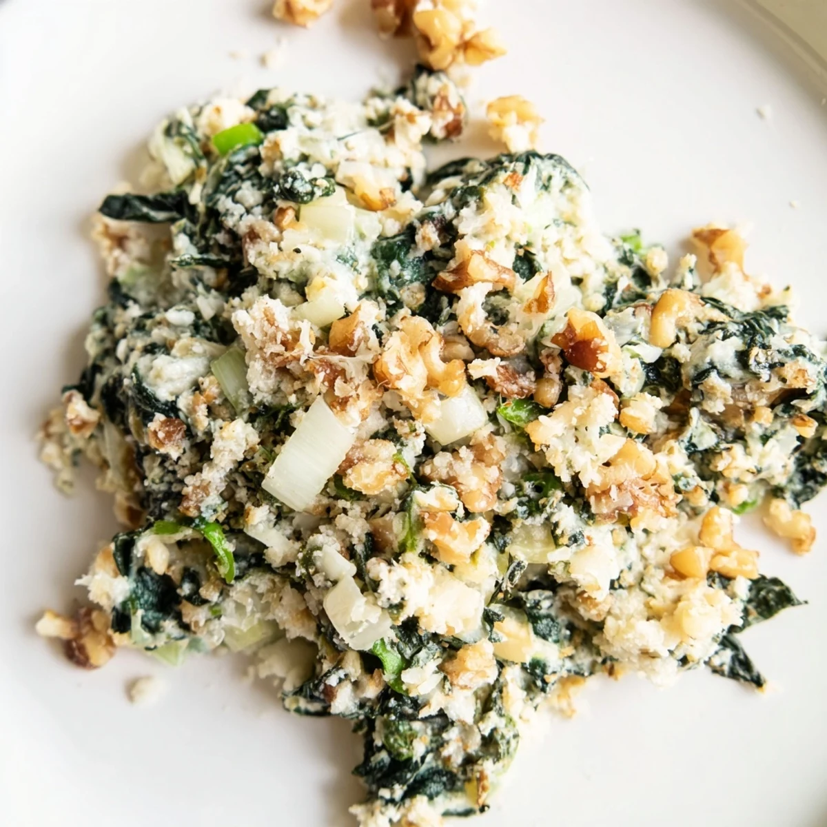 Warm, golden Fresh Spinach Clusters, fresh from the oven, ready to enjoy as a flavorful appetizer.