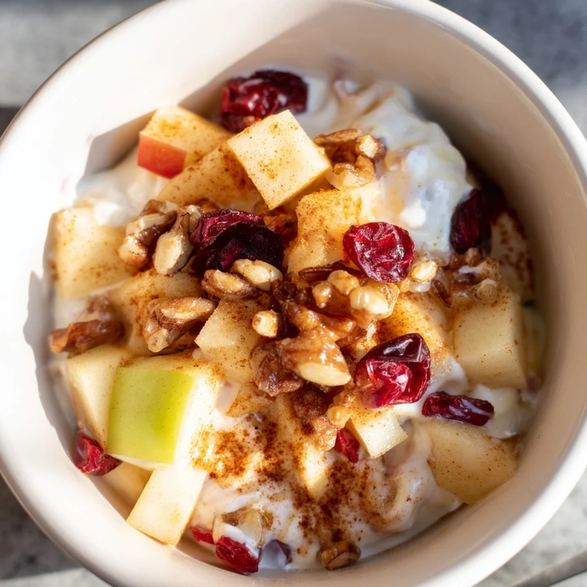 Fresh Apple Treat topped with honey drizzle and cinnamon, a healthy no-bake dessert perfect for quick snacks.