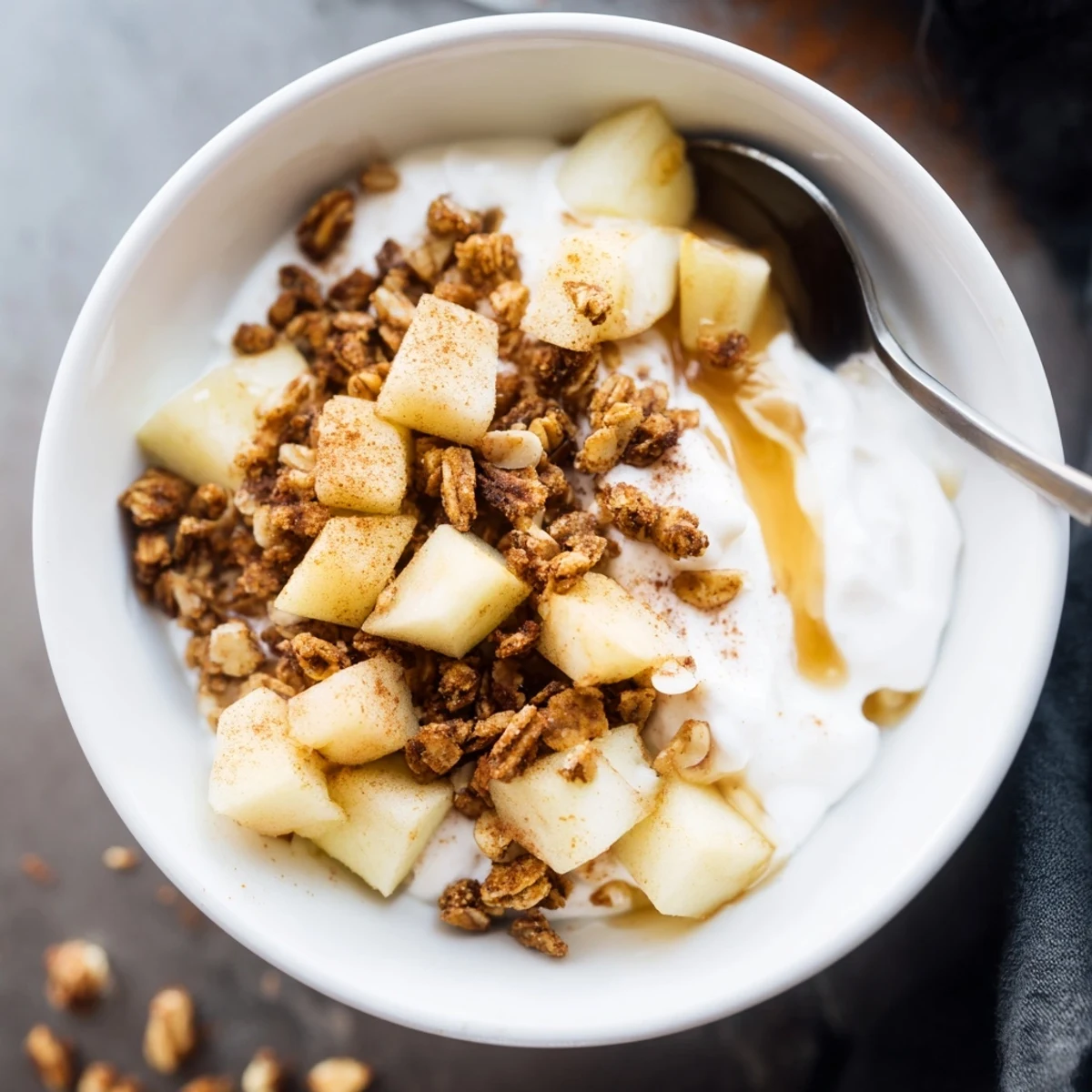 Healthy Fresh Apple Bowl layered with Greek yogurt, crisp apples, and granola, perfect for an easy nutritious snack.