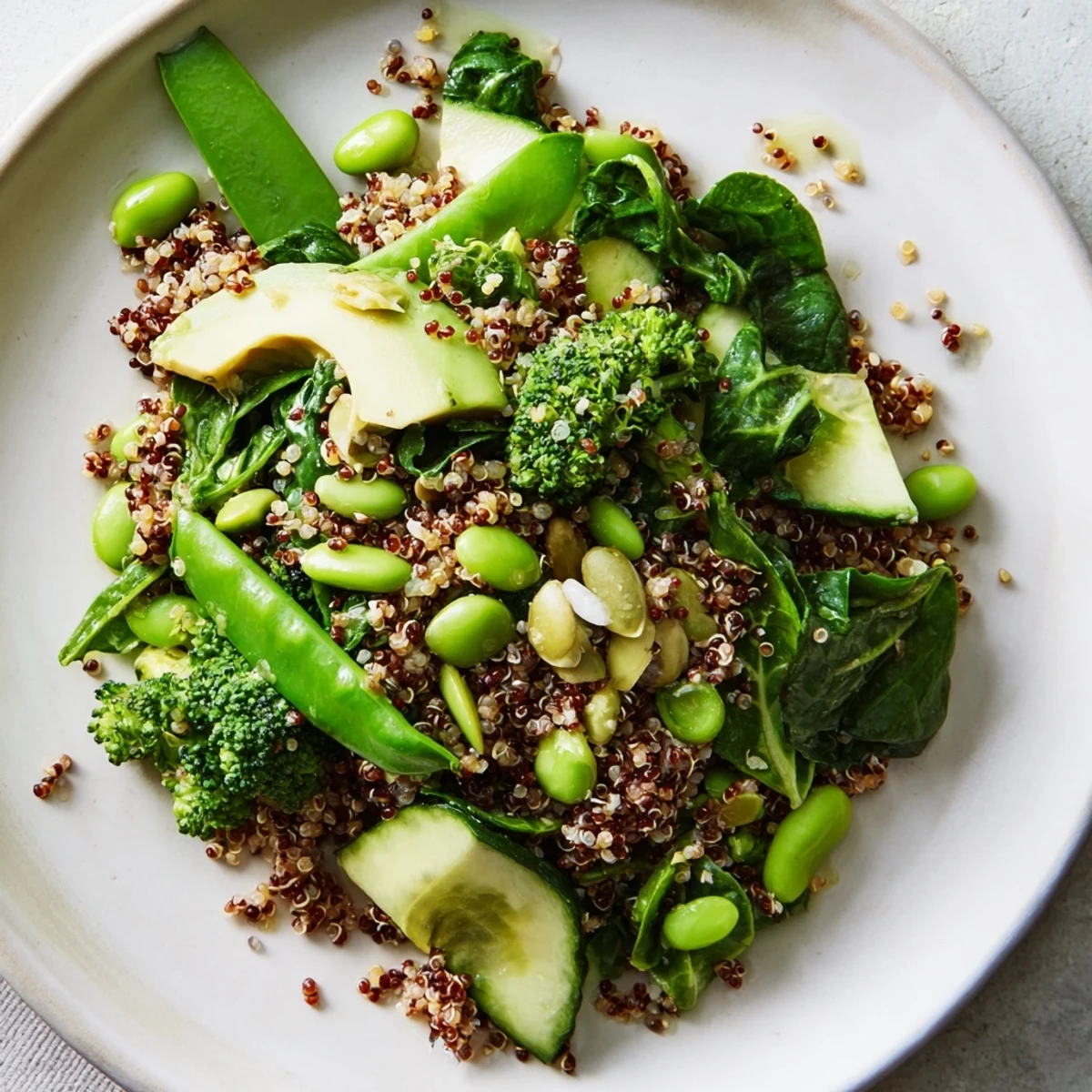 Creamy avocado slices and steamed broccoli in the Wholesome Green Bowl topped with pumpkin seeds and drizzled in zesty lemon-tahini sauce.