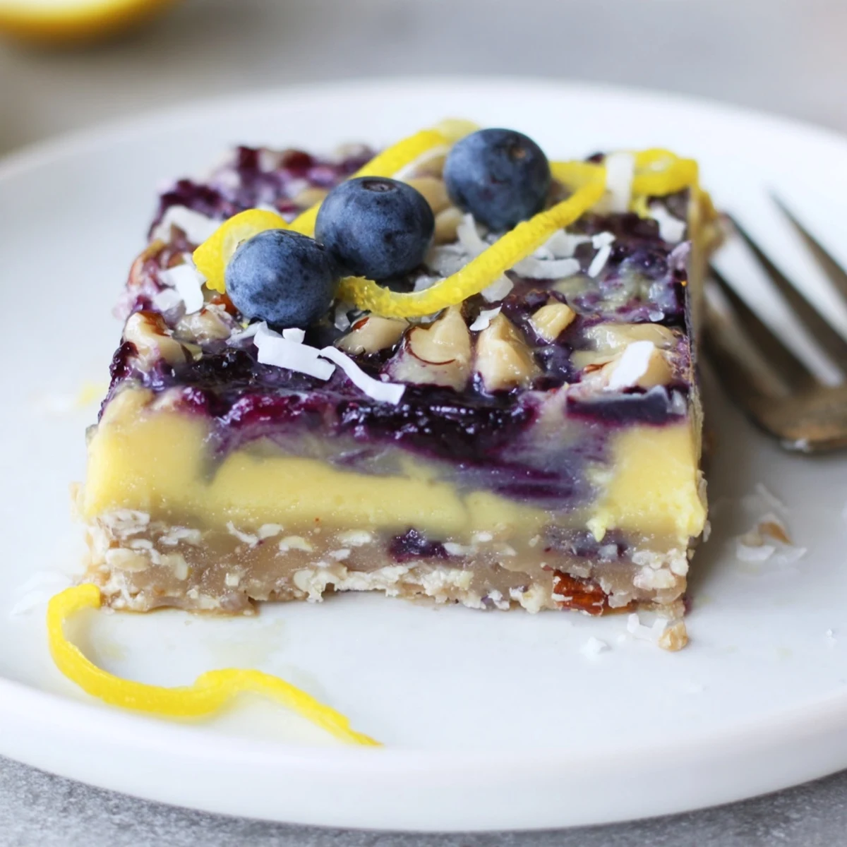 Blueberry Lemon Cashew Cream Bars chilled, creamy layers, tangy lemon and blueberry swirl