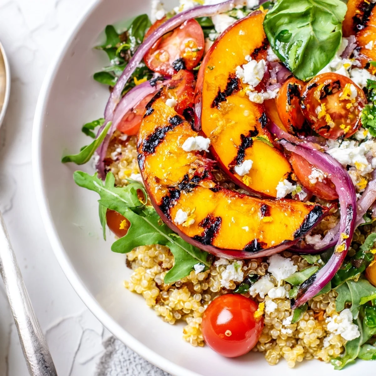Grilled Peach Basil Quinoa Grain Salad with smoky grilled peaches, lemony vinaigrette.