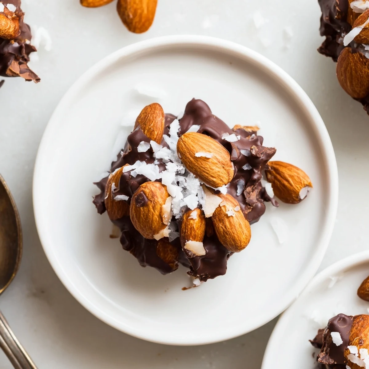 Fresh Dark Chocolate Almond Coconut Crunch Clusters cooling on tray, toasted coconut aroma