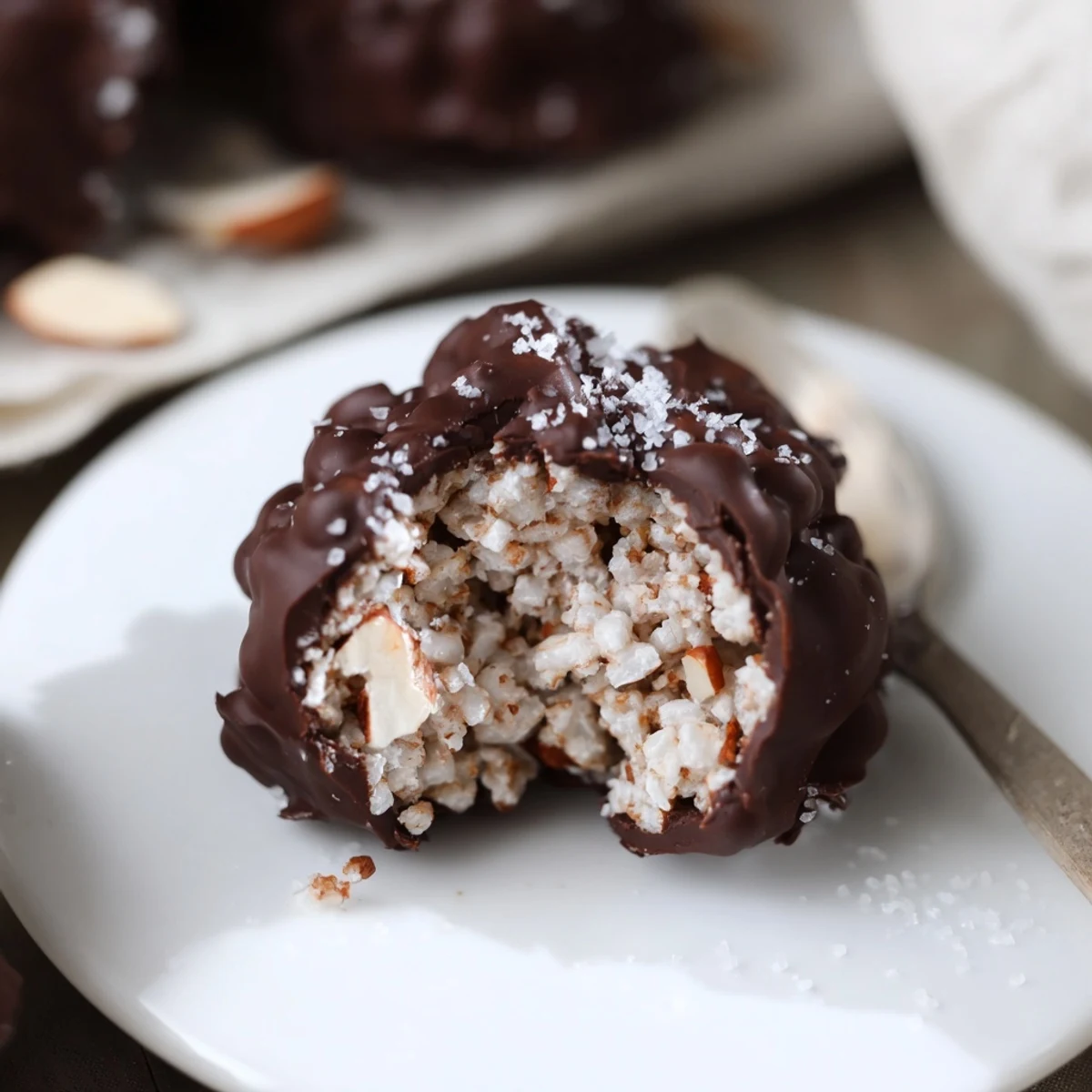 Warm glossy Dark Chocolate Almond Butter Coconut Crunch Clusters, perfect for snacking