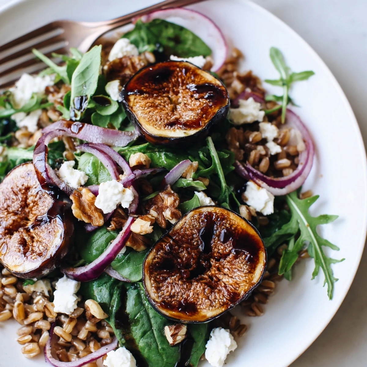 Roasted Fig Balsamic Farro Grain Salad with caramelized figs and creamy goat cheese